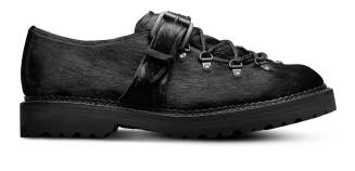 A side view of the Allen Edmonds Adirondack Low Hiking shoe in black calf hair, with the toe facing right.  