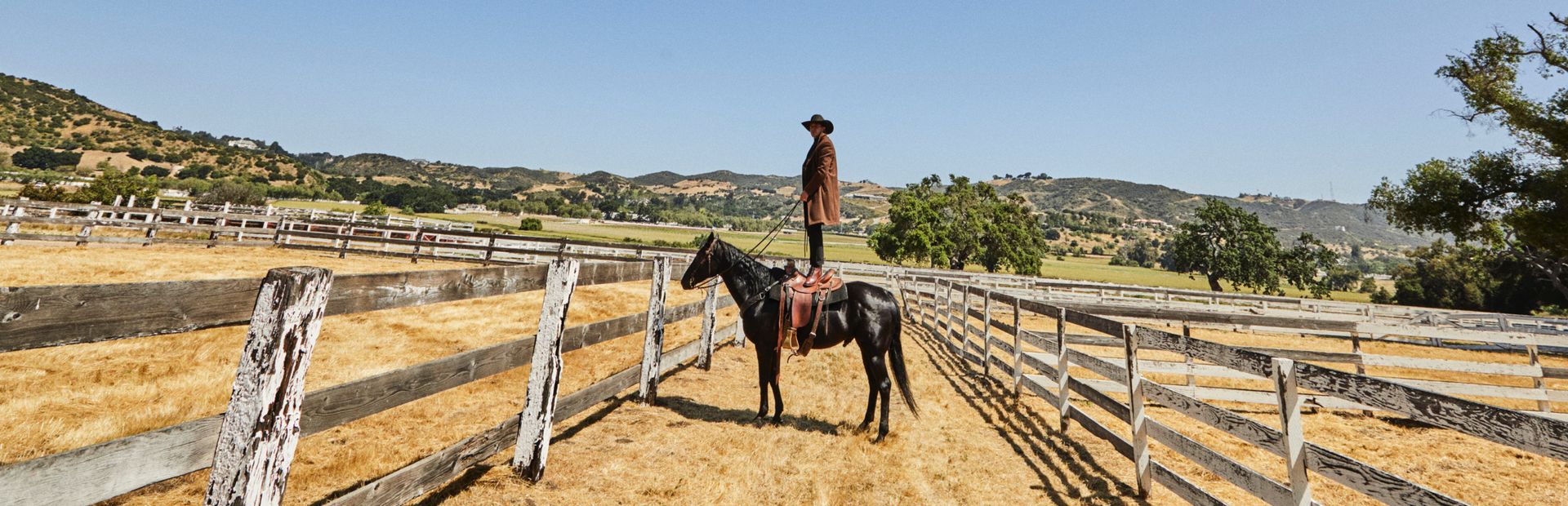 zane standing in saddle