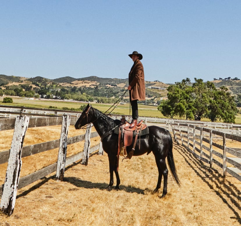 zane standing in saddle