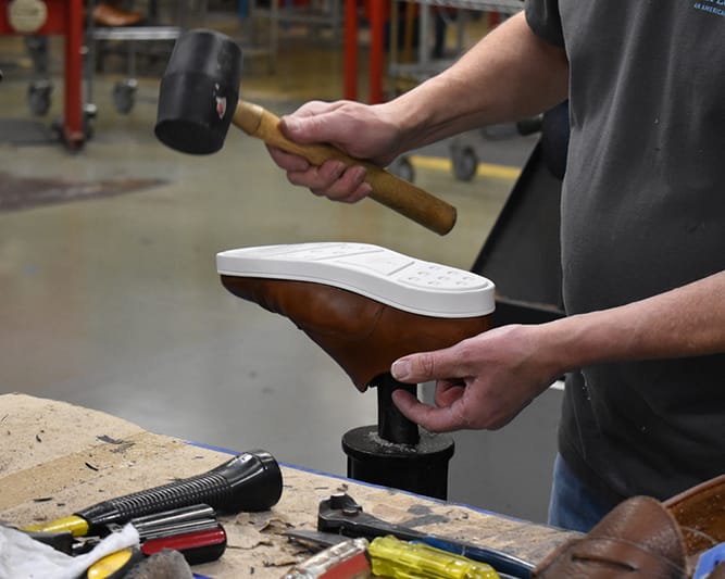 Outsoles hammered into place